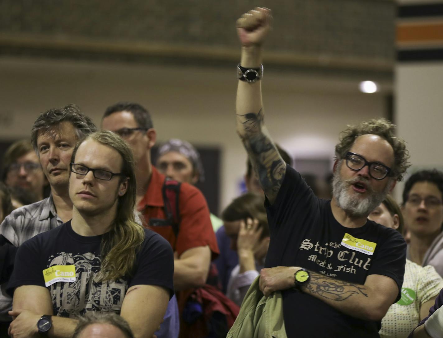 James Christenson raised his fist in support of remarks by a candidate for the park board who spoke to the Ward 9, Precinct 2 gathering at South High School. ] JEFF WHEELER &#xef; jeff.wheeler@startribune.com Minneapolis DFLers caucused for City Council, Park Board and mayoral races in Ward 9 at South High School and elsewhere around the city Tuesday evening, April 4, 2017. So many people attended the Precinct 2 caucus that they had to move the caucus from a classroom to the school cafeteria at