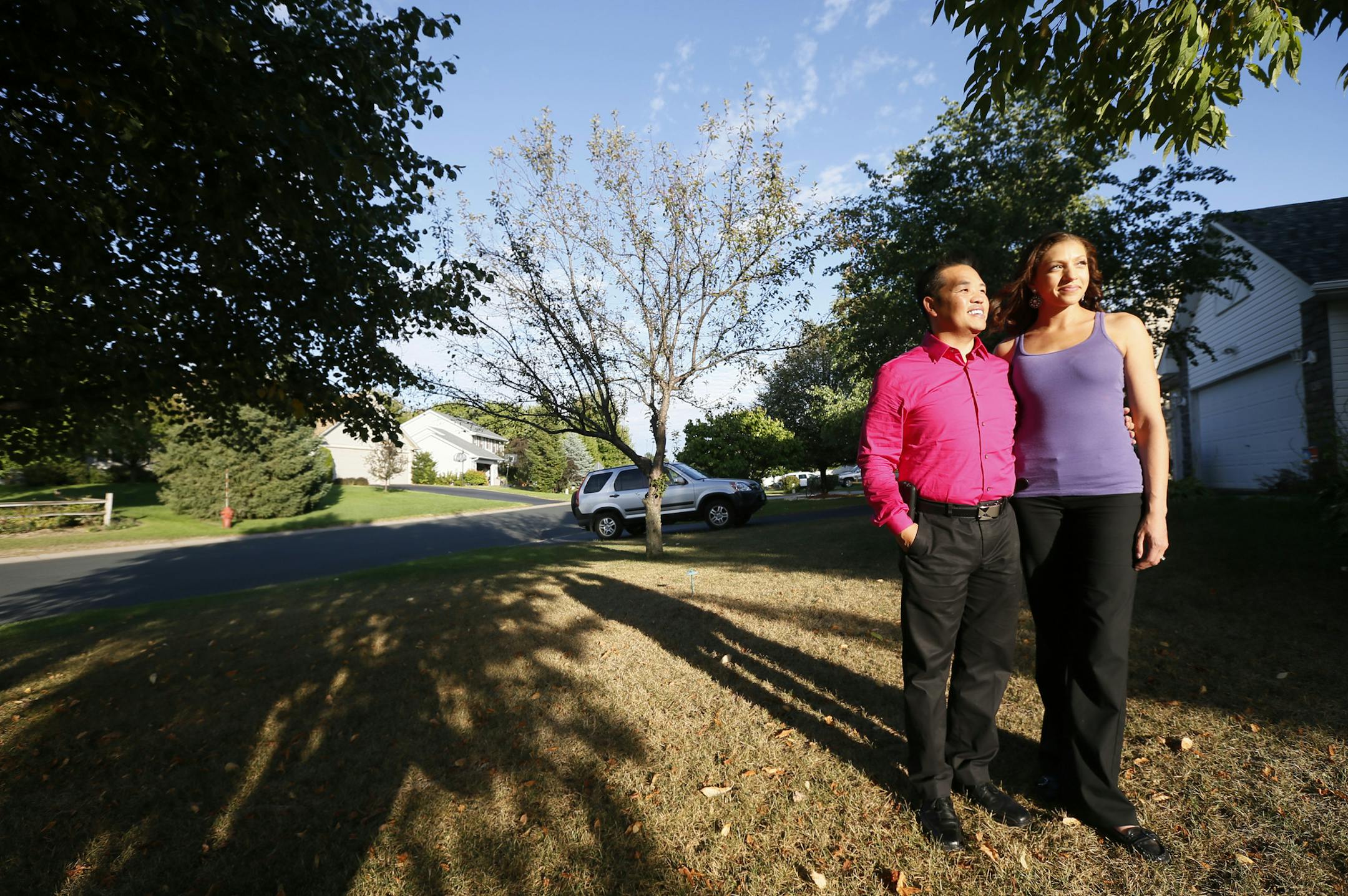 Tou Ger Xiong and his wife Andrea Bennett Xing at the their home in Woodbury September 10, 2013 ] JERRY HOLT ‚Ä¢ jerry.holt@startribune.com