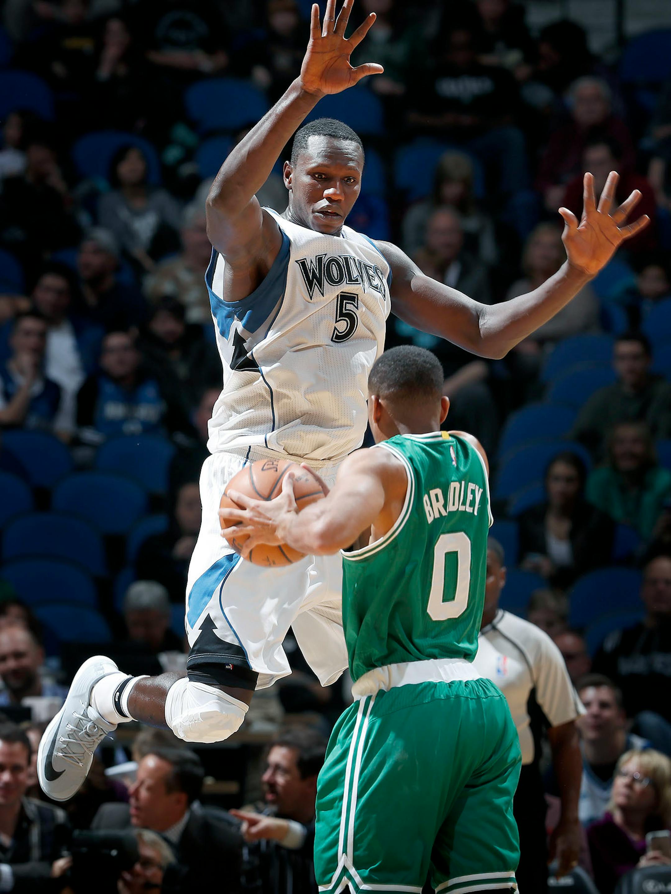 Gorgui Dieng (5) defended by Avery Bradley (0) in the third quarter.