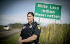 Mille Lacs Band of Ojibwe Interim Police Chief Sara Rice stood near the sign where she and her department have jurisdiction on the reservation, Thursd