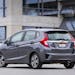 The 2015 Honda Fit adds more fuel efficiency, standard safety features and technology without a significant increase in price.