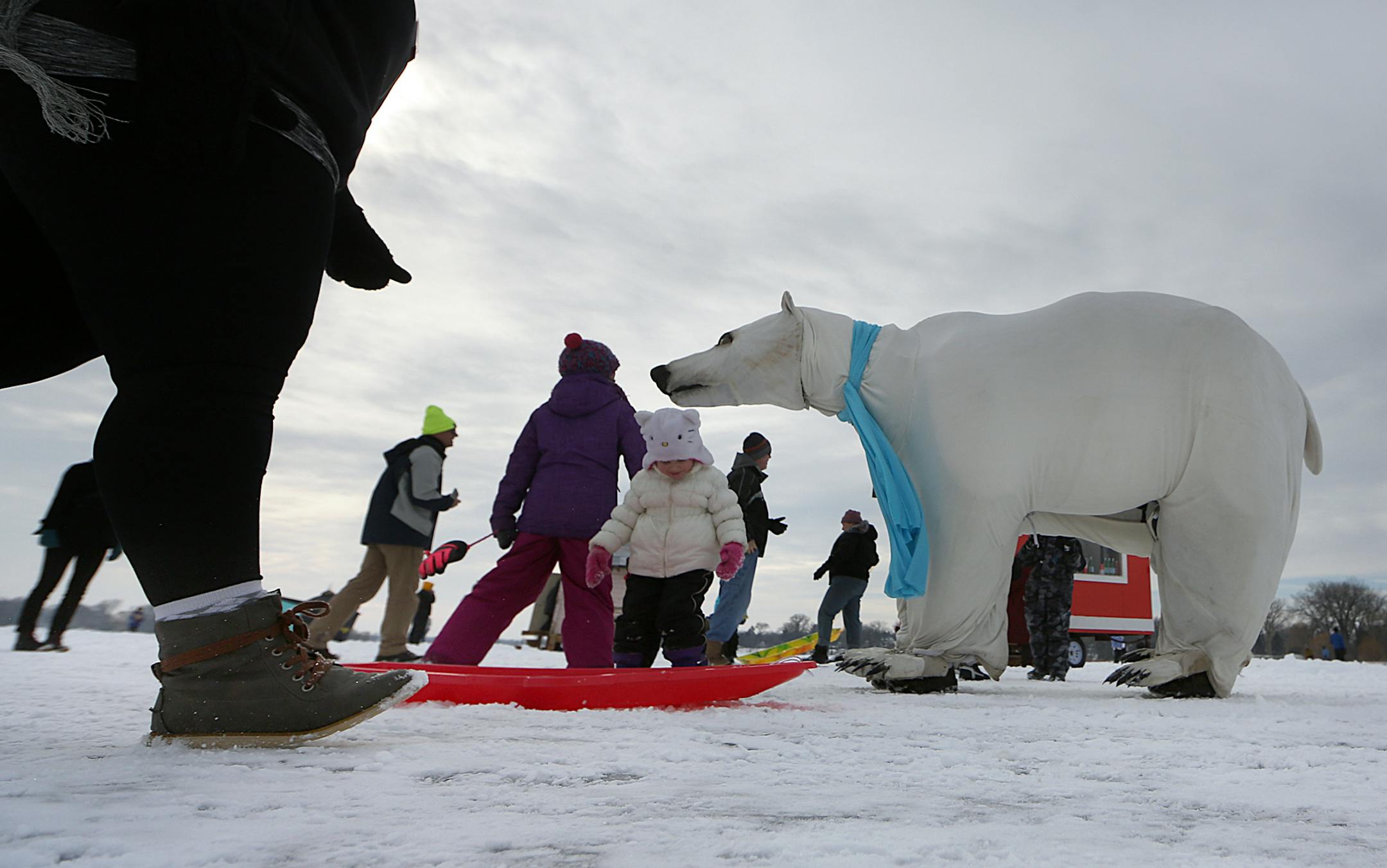 Lady Bear the Polar Bear Puppet attracted the attention of visitors at the Art Shanty Projets.] JIM GEHRZ ï james.gehrz@startribune.com / White Bear Lake, MN / February 6, 2016 /12:00 AM ñ BACKGROUND INFORMATION: For 10 years, Art Shanty Projects has organized a month-long festival on a frozen lake surface into an interactive, artist-driven temporary community that expands notions of art and artist. The 2016 HYPERLINK "/about/program"On-Ice Program will take place on White Bear Lake ev