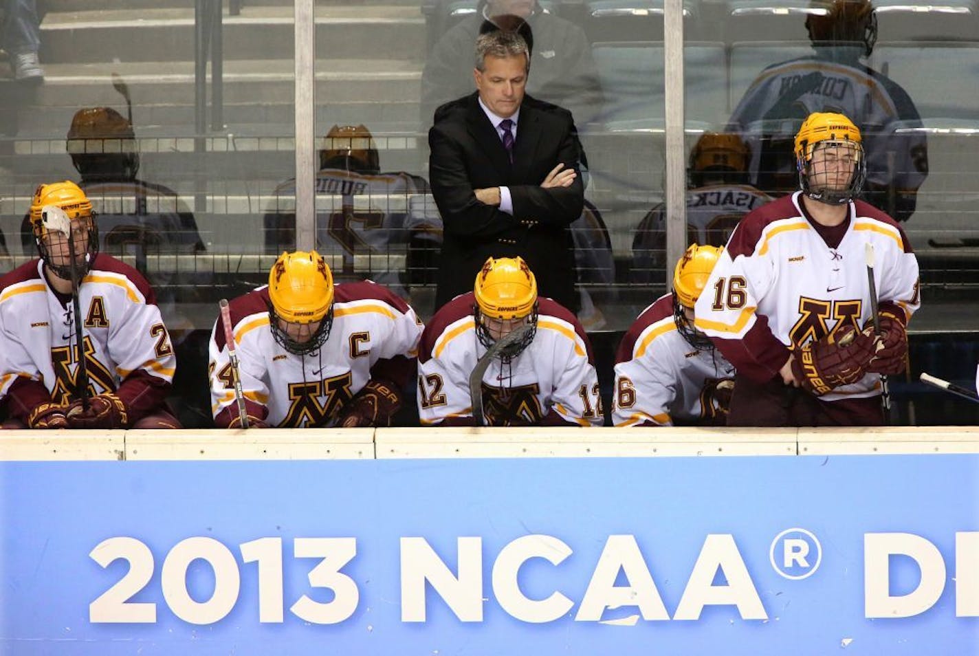 Minnesota head coach Don Lucia and his bench were stunned being down 2-0 to Yale near the end of the second period