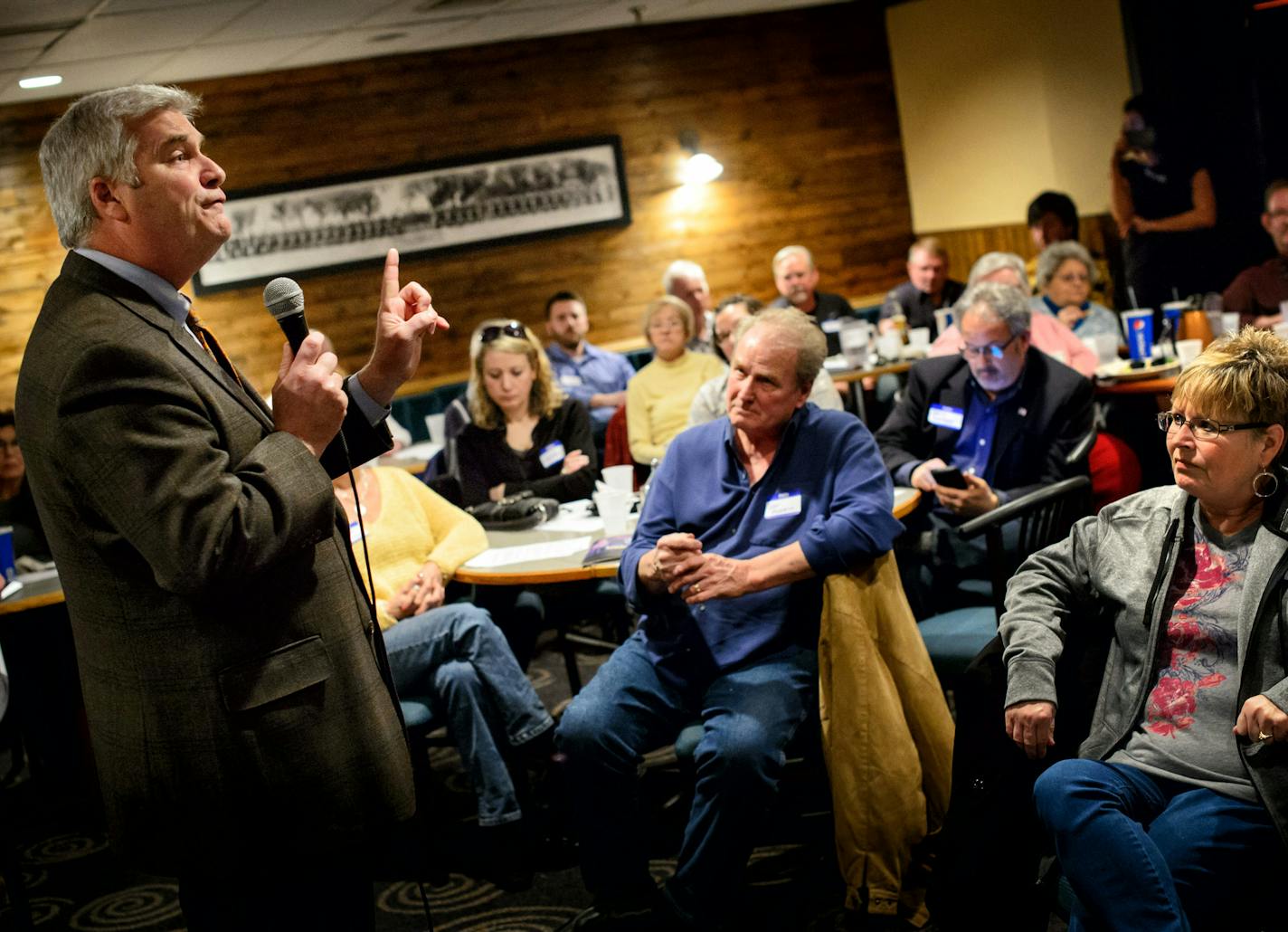 Congressman Tom Emmer strongly defended his decision to call out members of his own party and vote to approve funding for the Department of Homeland Security earlier this month. He spoke Tuesday night to a gathering of the Tea Party Patriots in Brooklyn Center, Many of whom were skeptical of some of his recent actions and were looking for explanations. ] GLEN STUBBE * gstubbe@startribune.com Tuesday, March 10, 2015