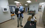 Former pastor Jason Berry greeted children before he helped feed them a free lunch at the Anoka Community Mission, Tuesday, January 10, 2017 in Anoka,