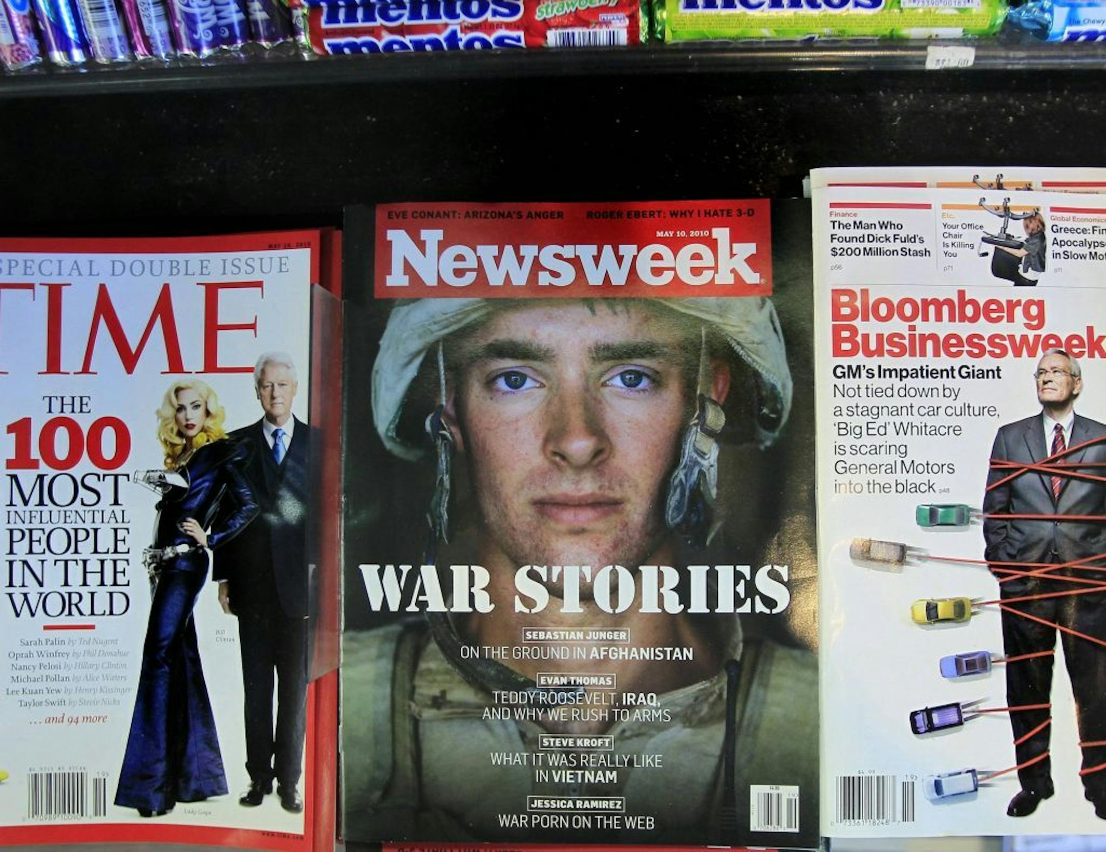 Newsweek magazine is displayed on a shelf at a news stand at South Station in Boston, Wednesday, May 5, 2010. The Washington Post Co. is putting Newsweek up for sale in hopes that another owner can figure out how to stem losses at the 77-year-old weekly magazine.