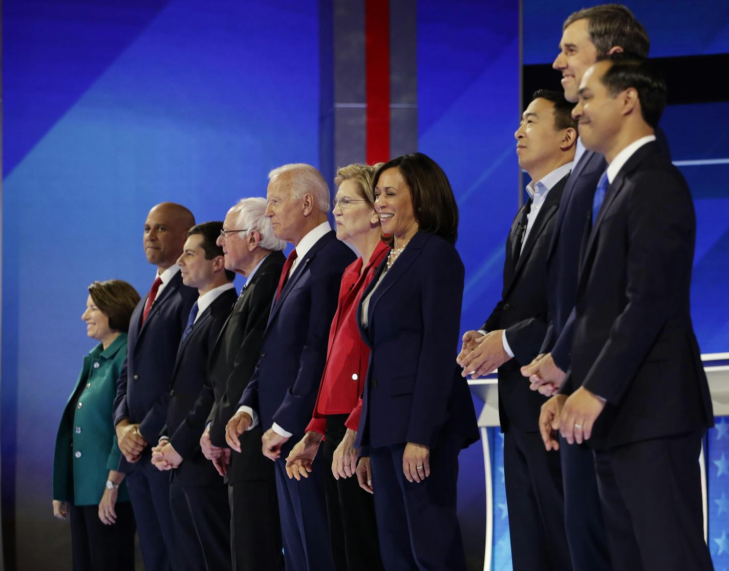 From left, Democratic presidential candidates Sen. Amy Klobuchar, D-Minn., Sen. Cory Booker, D-N.J., South Bend Mayor Pete Buttigieg, Sen. Bernie Sanders, I-Vt., former Vice President Joe Biden, Sen. Elizabeth Warren, D-Mass., Sen. Kamala Harris, D-Calif., entrepreneur Andrew Yang, former Texas Rep. Beto O'Rourke and former Housing Secretary Julian Castro are introduced for the Democratic presidential primary debate hosted by ABC on the campus of Texas Southern University Thursday, Sept. 12, 201