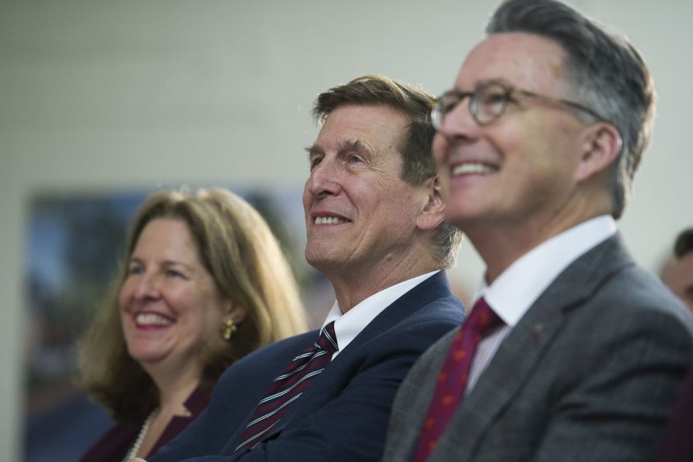 Alexandria Mayor Allison Silberberg, left, Rep. Don Beyer, D-Va., center, and Virginia Tech President Tim Sands participate in the announcement of Virginia Tech's 1 million square-foot technology focused campus in Alexandria, Va., to build one of it's two new headquarters, Tuesday, Nov. 13, 2018. The project was cited as a key reason Amazon selected Virginia for a new headquarters.