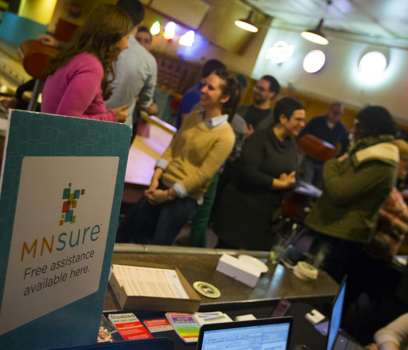 A MNsure event dubbed "Bowling for Health Insurance" at the Bryant Lake Bowl in Minneapolis, Minn. on Tuesday, February 3, 2015. This was an outreach strategy, originally geared to the GLBT community, to get people into coverage by the Feb. 15 close of open enrollment through the MNsure health insurance exchange. ] RENEE JONES SCHNEIDER &#x2022; reneejones@startribune.com