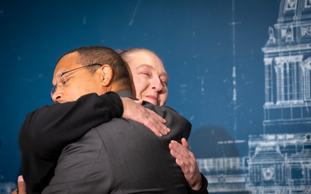 Attorney General Ellison hugged Nicole Smith-Holt as he announced a settlement with Eli Lilly in his litigation against the three largest insulin manufacturers on Wednesday in St. Paul.