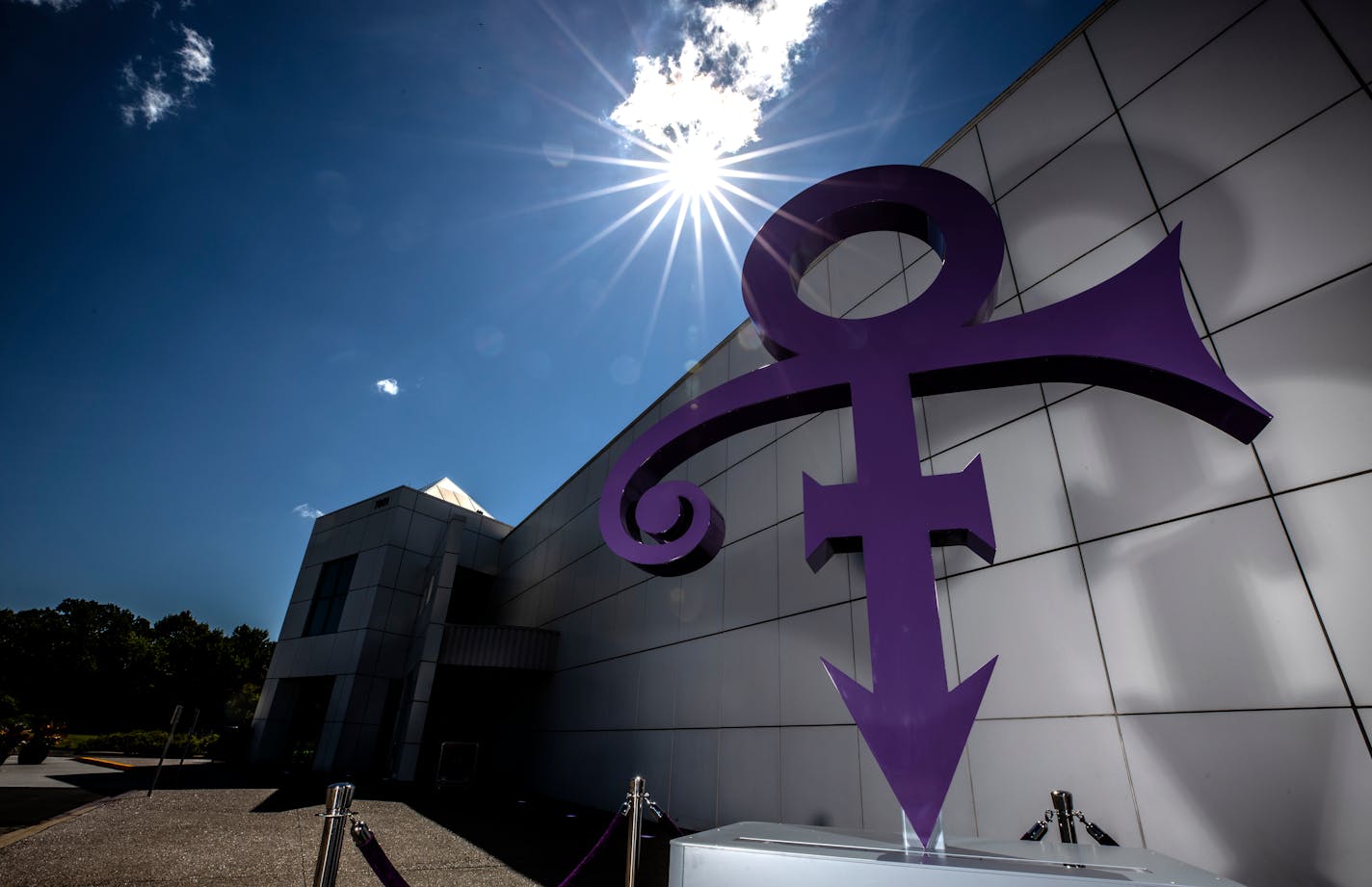 A new statue of Prince's Love Symbol was unveiled outside Paisley Park in Chanhassen, Minn.