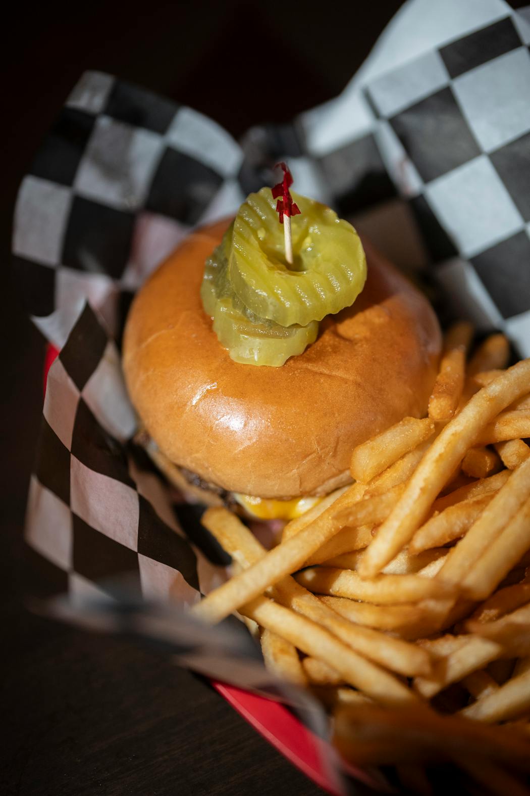 A burger at Fool Me Once, which has the spirit of a dive bar, but where everything is intentional — and clean. 