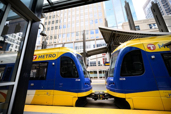 A light rail train stopped at the platform at 5th Street and Nicollet in Minneapolis. Transit is one of several areas overseen by the Metropolitan Cou
