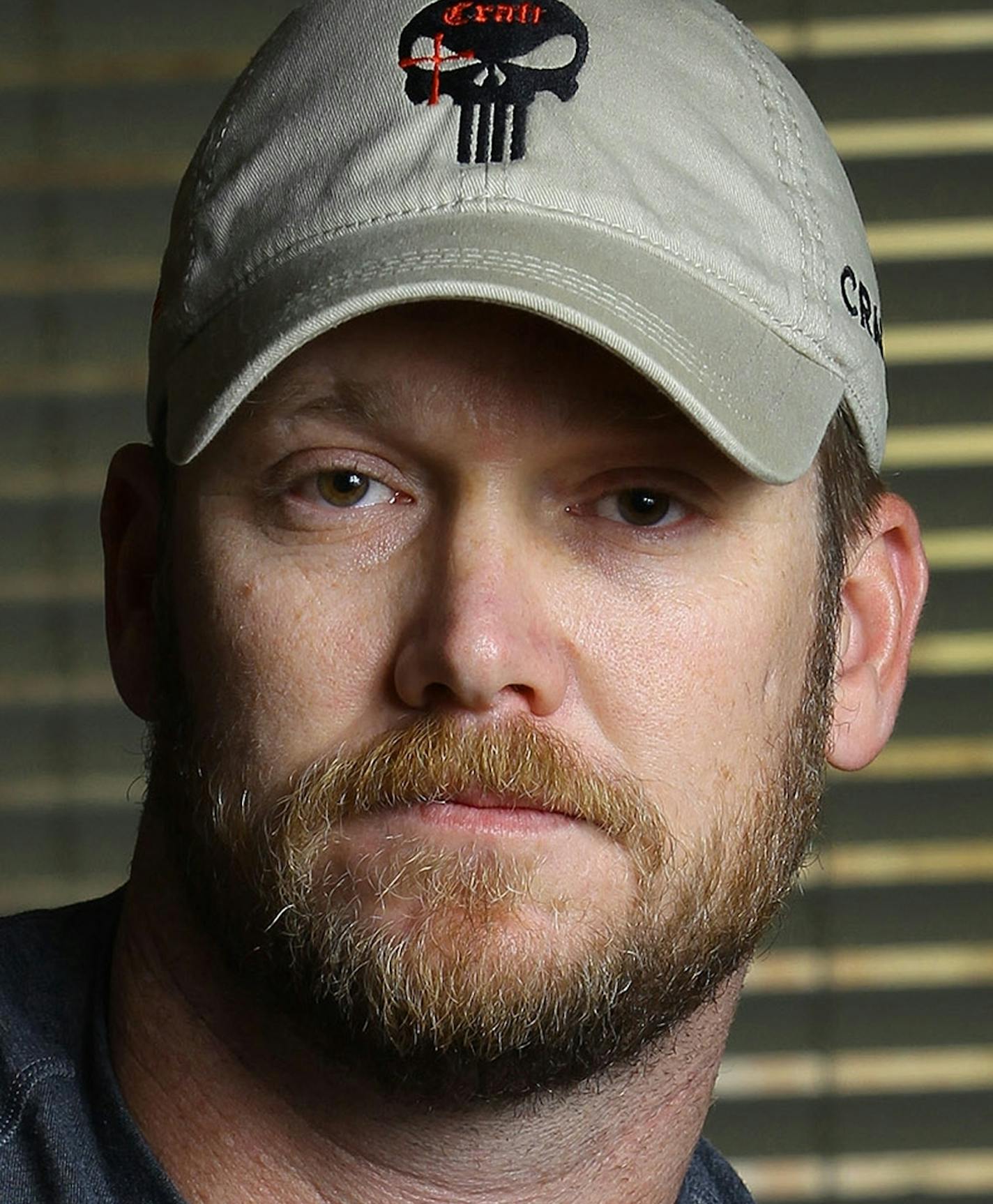 FILE - This combination of file photos shows Chris Kyle, left, former Navy SEAL and author of the book &#xec;American Sniper,&#xee; on April 6, 2012, and former Minnesota Gov. Jesse Ventura, right, on Sept. 21, 2012. A federal appeals court has thrown out a $1.8 million judgment awarded to Ventura, who says he was defamed in the late author Chris Kyle's bestselling book "American Sniper." (AP Photo/File)