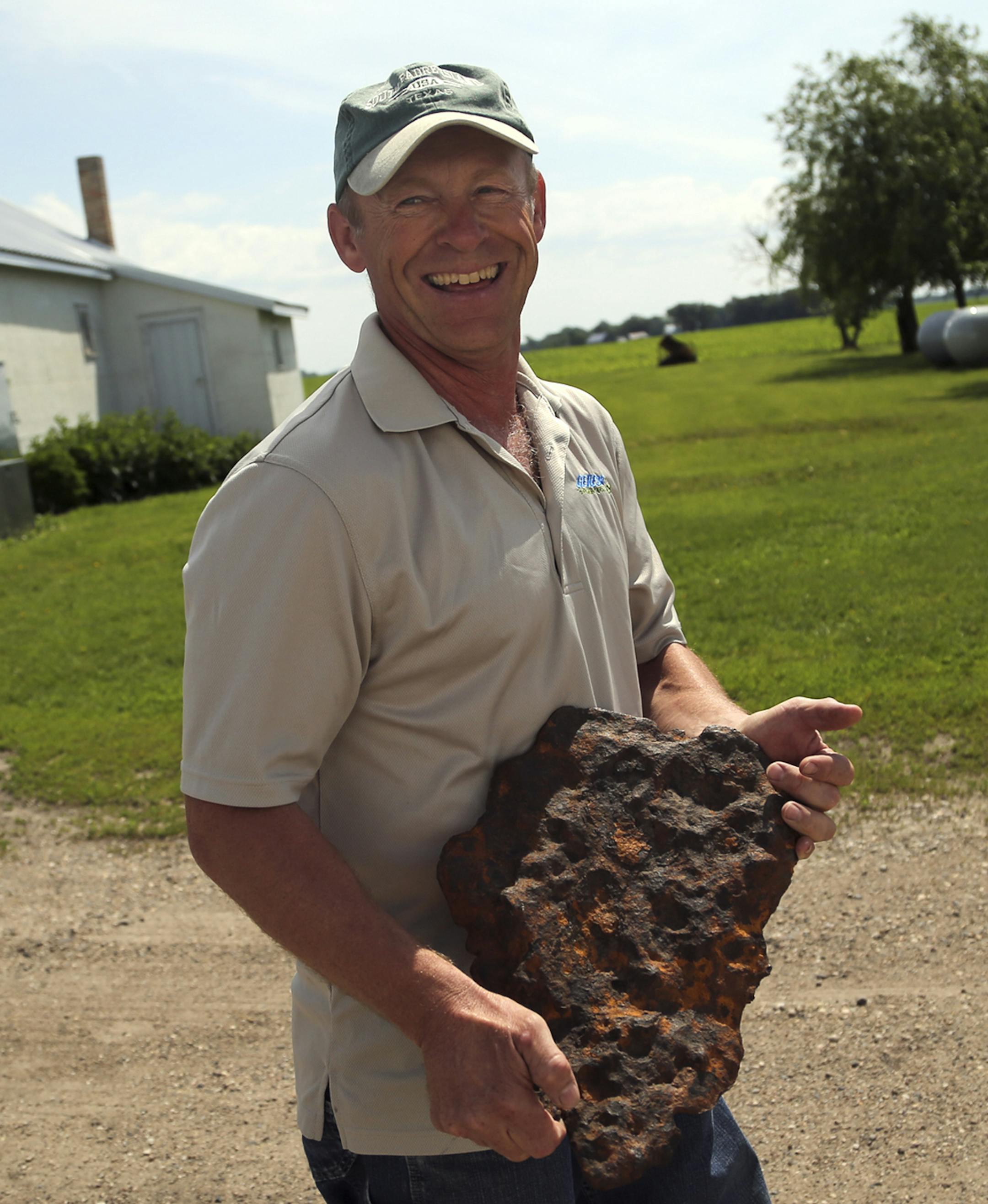 Bruce Lilienthal with the 30 plus pound meteor he found about two years ago while plowing a field and seen Wednesday, June 19, 2013, at the Lilienthal farm near Arlington, MN.](DAVID JOLES/STARTRIBUNE) djoles@startribune.com A Minnesota farmer has found a rare meteorite while plowing his field near Arlington. A University of Minnesota geology professor has confirmed that the 33-pound rock came from outer space, probably more than a century ago, and is likely 4.6 billion years old.**Bruce Lilient
