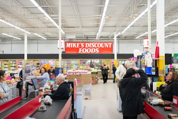 Shoppers scoop up deals at Mike’s Discount Foods in Fridley, which sells heavily discounted items ranging from produce and cereal close to their “