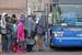 Passengers made their way onto the Megabus at a pick-up location near the Metrodome in downtown Minneapolis on March 29, 2013.