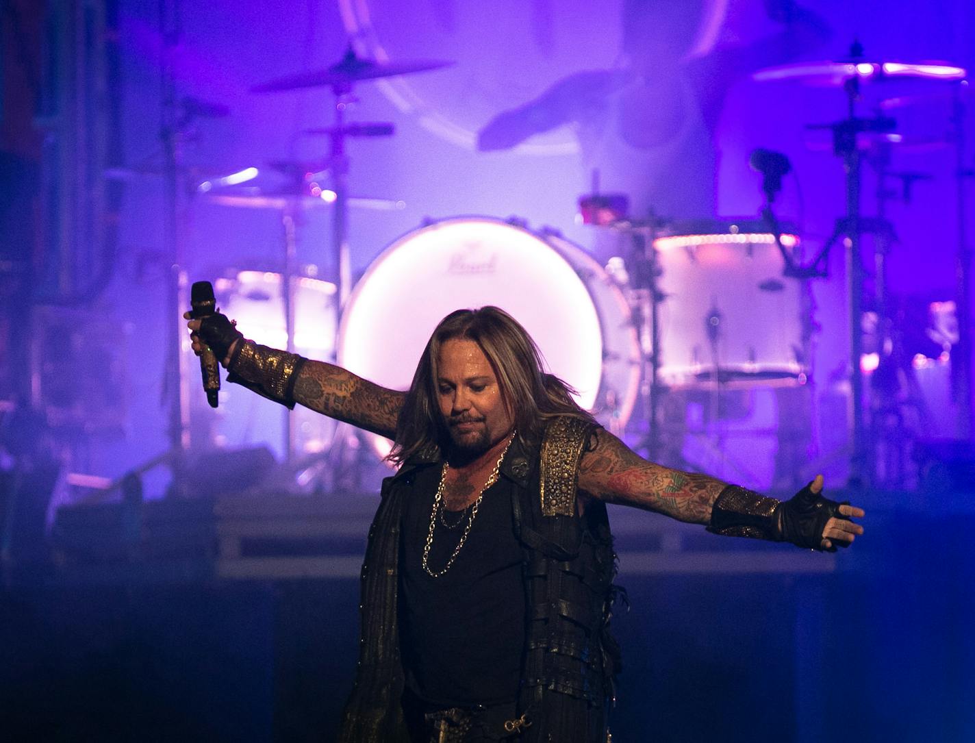 Motley Crue vocalist Vince Neil performs Saturday night at Xcel Energy Center. ] AARON LAVINSKY &#x2022; aaron.lavinsky@startribune.com Motley Crue performs at Xcel Energy Center Saturday, Nov. 15, 2014.