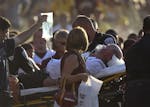 Gopher Head Coach Jerry Kill was carted off by medics after he had a seizure near the end of the game at TCF Bank Stadium in Minneapolis, Minn., Satur