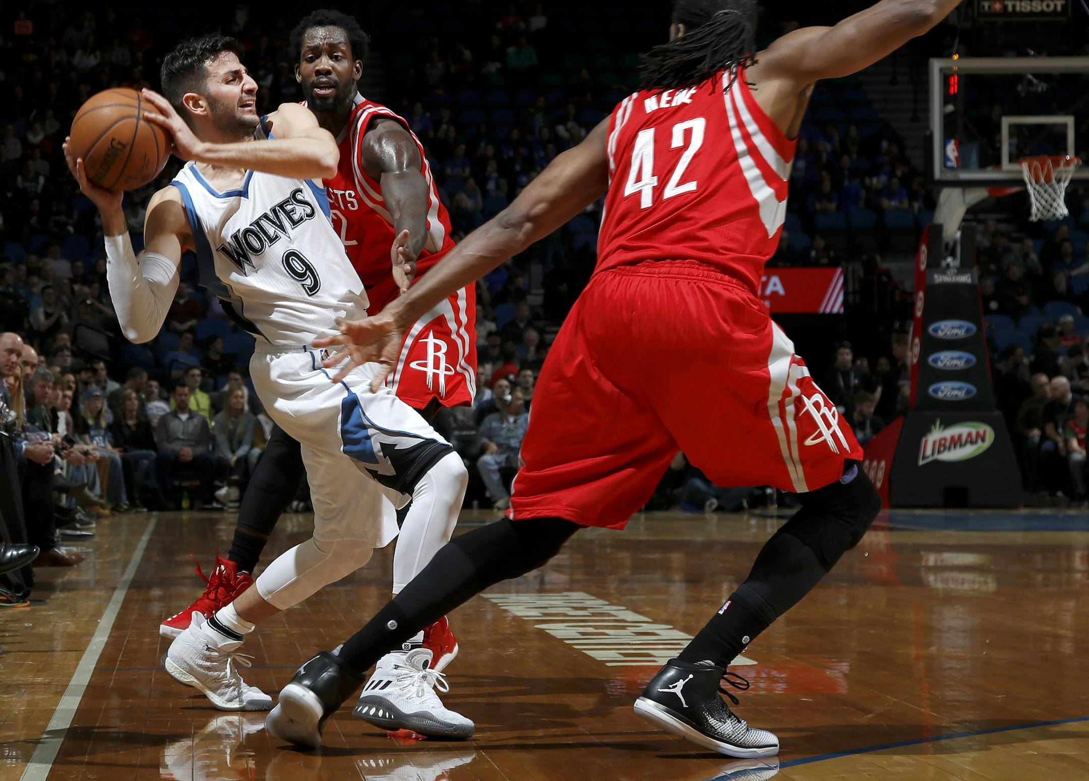 Ricky Rubio (9) looked for a teammate to pass during the second quarter Wednesday night against Houston. Rubio had 10 points and 17 assists.