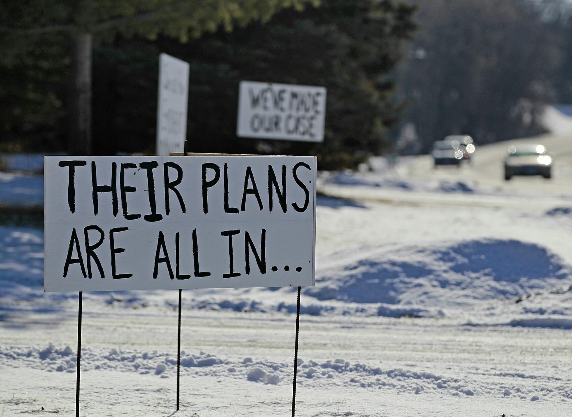 Signs displaying the sentiments of a tight-knit Inver Grove Heights neighborhood that is being threatened by a road realignment project intended to serve a new housing development are posted along Argenta Trail, Thursday, February 5, 2015 in Inver Grove Heights, MN. The realignment would require the city to acquire about a dozen houses through eminent domain, knocking them down to make space for the road. ] (ELIZABETH FLORES/STAR TRIBUNE) ELIZABETH FLORES • eflores@startribune.com