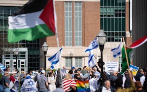 People gather for a prayer gathering supporting Israel held on the campus of the University of Minnesota in Minneapolis on May 3.