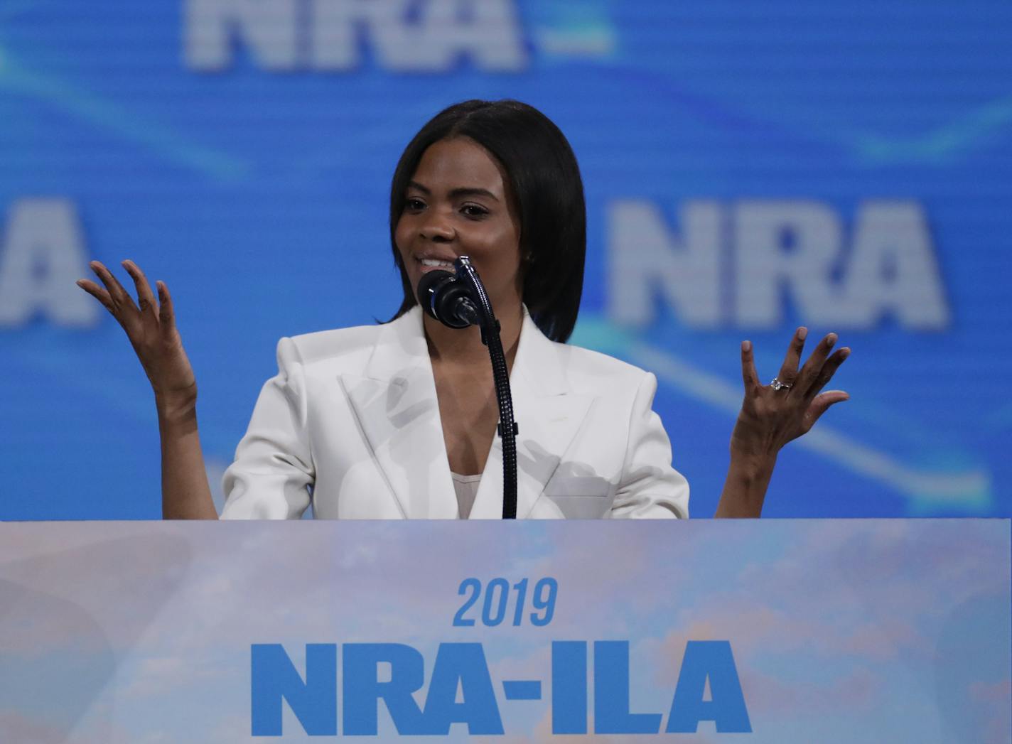 Candace Owens, director of urban engagement for Turning Point USA,, speaks at the National Rifle Association Institute for Legislative Action Leadership Forum in Lucas Oil Stadium in Indianapolis, Friday, April 26, 2019. (AP Photo/Michael Conroy) ORG XMIT: MER13d3fffcc4c56b856f495c8129573