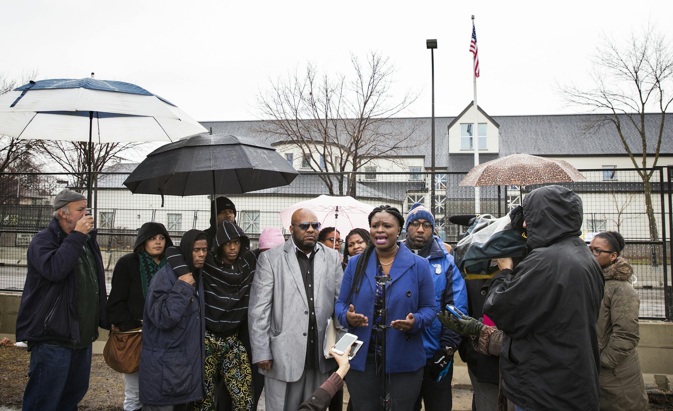 Minneapolis NAACP president Nekima Levy-Pounds speaks to the media during a press conference outside the Fourth Precinct police station in Minneapolis on Tuesday, December 8, 2015. ] (Leila Navidi/Star Tribune) leila.navidi@startribune.com BACKGROUND INFORMATION: The NAACP held a press conference outside the Fourth Precinct demanding, among other things, that the city take down the barricades at the precinct and work on economic development on the North Side.