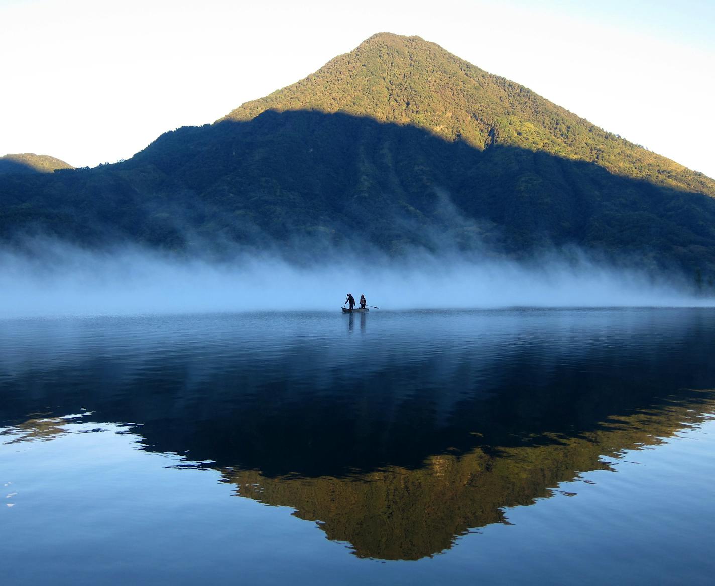 Linda Sandell
Lake Atitl&#xb7;n, Guatemala My last day at Lake Atitl&#xb7;n in Guatemala, I captured this early morning photo. The air was cold so mist rose up from the warm lake water. Daily, I enjoyed the vibrant colors in the Guatemalan landscape; the markets, street art and Maya textiles. I soaked up the serenity that morning while reflecting on the warmth of the Guatemalan people I was very fortunate to meet. Camera Canon Powershot S95
1. Linda Sandell Mounds View, MN 2. I took this photo f