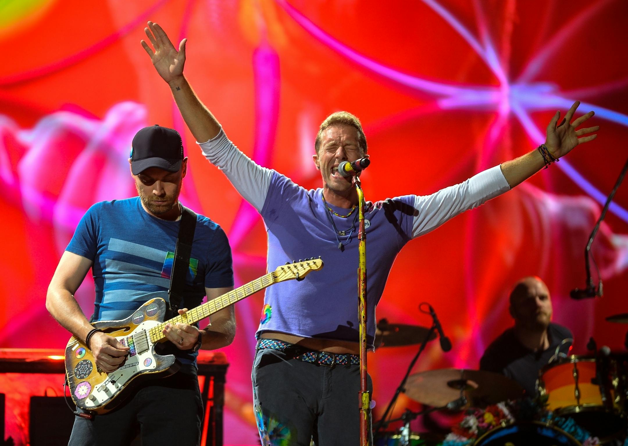 Coldplay frontman Chris Martin, right, and guitarist Jonny Buckland performed Saturday night.