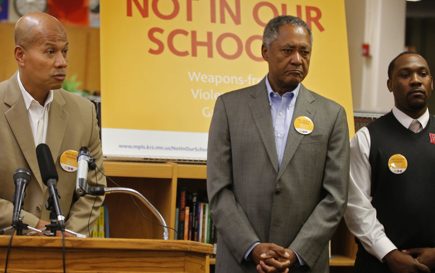 At Patrick Henry H.S. in Minneapolis where parents and school official gathered to address school safety , interim superintendent Michael Goar, far left addressed questions. Don Samuels, director of the board of education also answered questions.]Richard Tsong-Taatarii/rtsong-taatarii@startribune.com