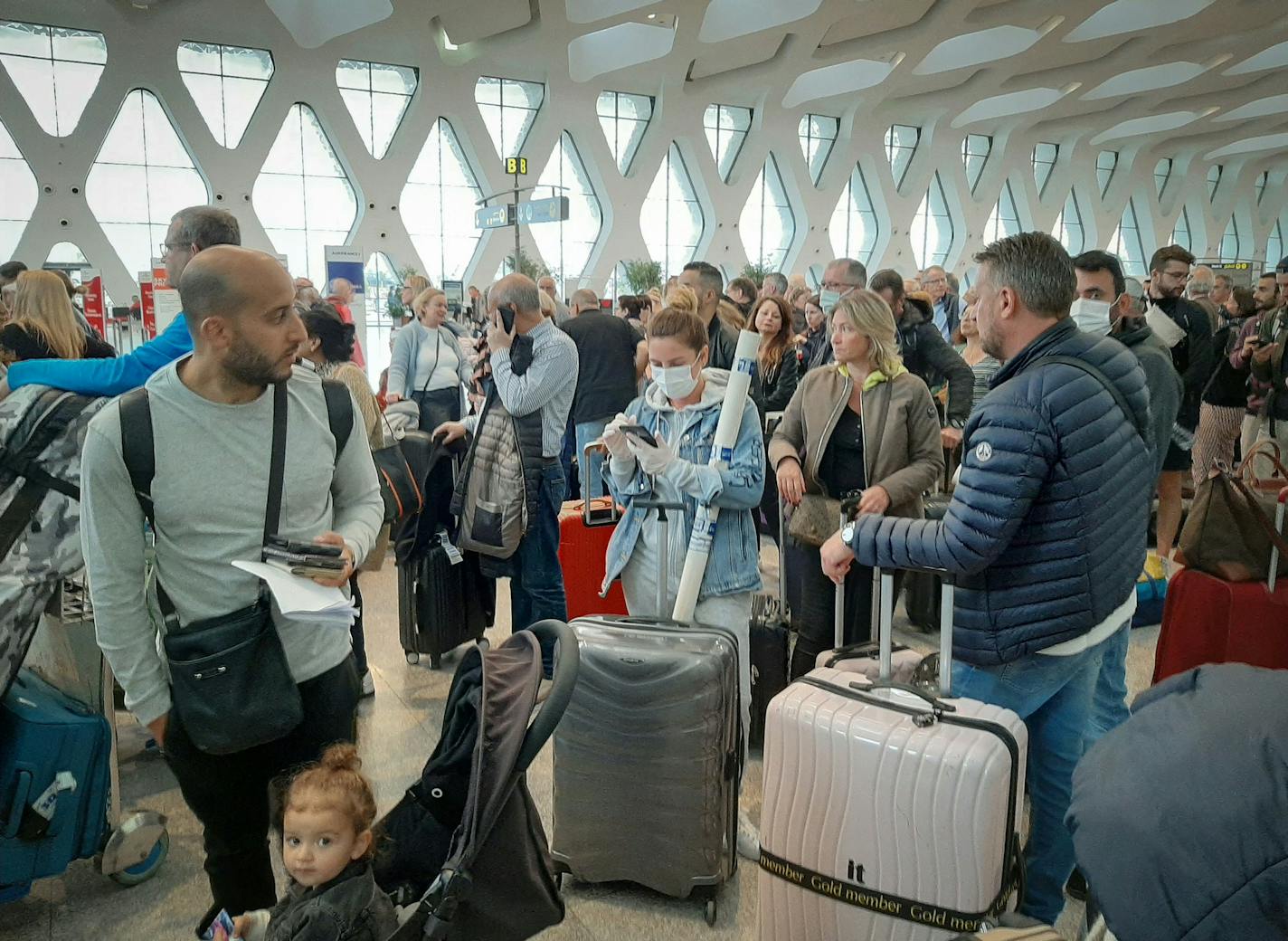 Passengers wait for their flights at the Marrakesh Airport on March 15, 2020. Several special flights departed Morocco, taking thousands of stranded Europeans home as the kingdom announced it was suspending all regular air traffic due to the coronavirus, authorities and airports said. (AFP/Getty Images/TNS) ORG XMIT: 1609729