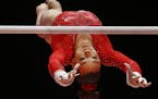 Maggie Nichols of the U.S. performs on the uneven bars during the women's team final competition at the World Artistic Gymnastics championships at the