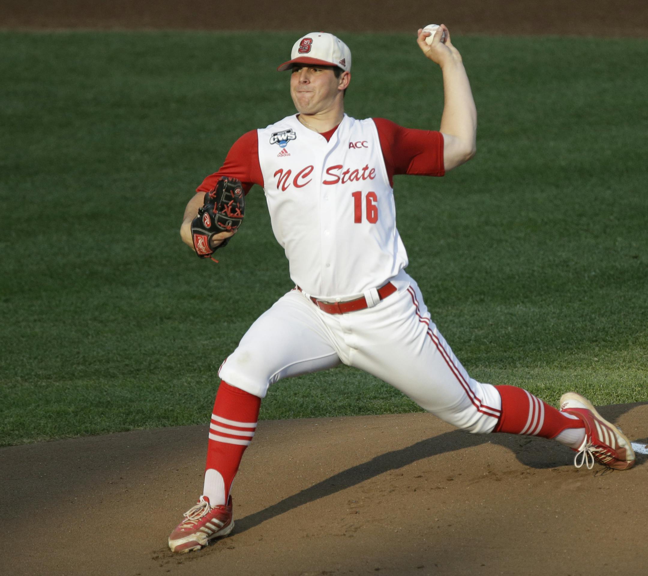 FILE - In this June 20, 2013 file photo, North Carolina State pitcher Carlos Rodon throws against North Carolina during an NCAA College World Series elimination baseball game in Omaha, Neb. The Houston Astros are on the clock to lead off the Major League Baseball draft for the third straight year Thursday night June 5, 2014. Houston has a few options with the first pick, including a pair of California high school stars in left-hander Brady Aiken and catcher-outfielder Alex Jackson, and North Car