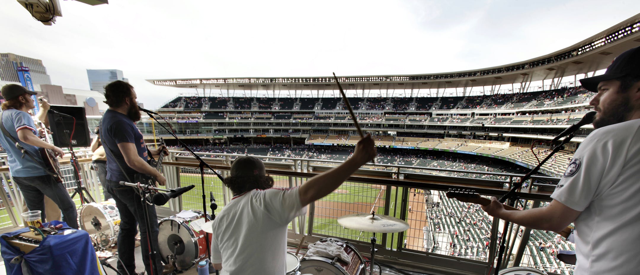 Left to right: Bassist Chris Holm, frontman Gabriel Douglas, drummer Mark Larson and guitarist Nate Case of the 4onthefloor warmed up the crowd as it filed into Target Field before Wednesday's Twins game.