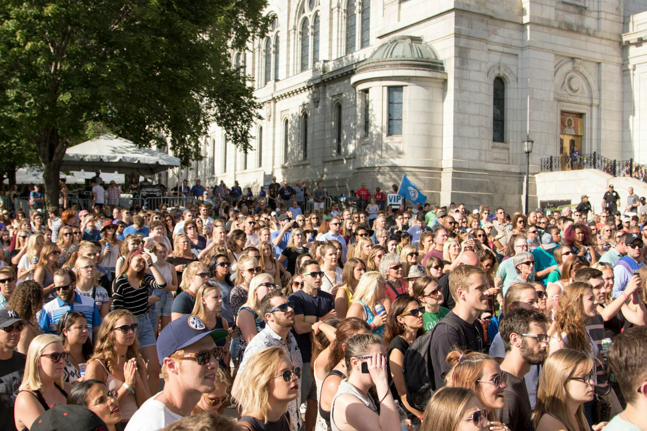 The crowd watches as Andra Day performs, with the Basilica in the background on day one of the 2016 Basilica Block Party on July 8, 2016 at the Basilica in Minneapolis, Minn.