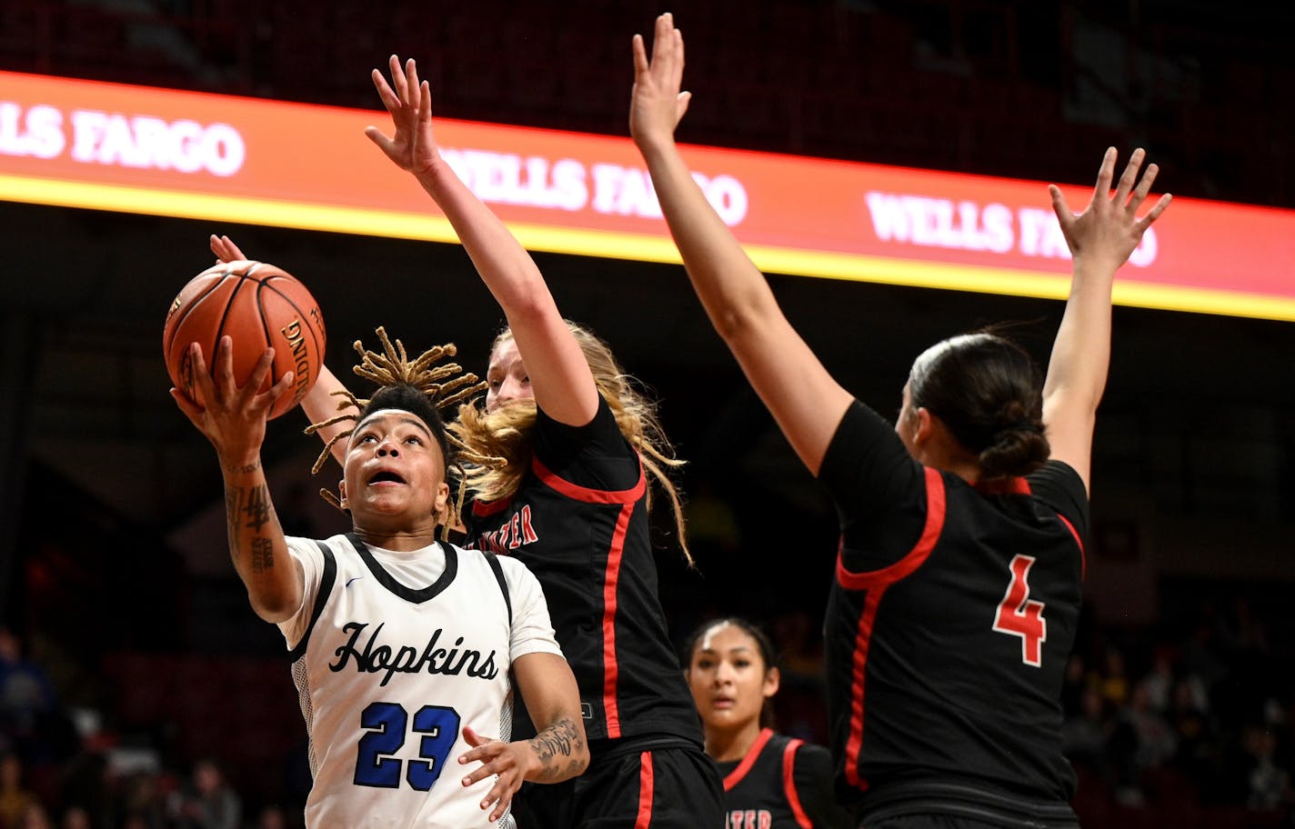 Hopkins guard Liv McGill (23) scores a layup against Stillwater in the first half Thursday, March 16, 2023 during the Class 4A girls' basketball state tournament semifinals at Williams Arena in Minneapolis, Minn.. ] AARON LAVINSKY • aaron.lavinsky@startribune.com