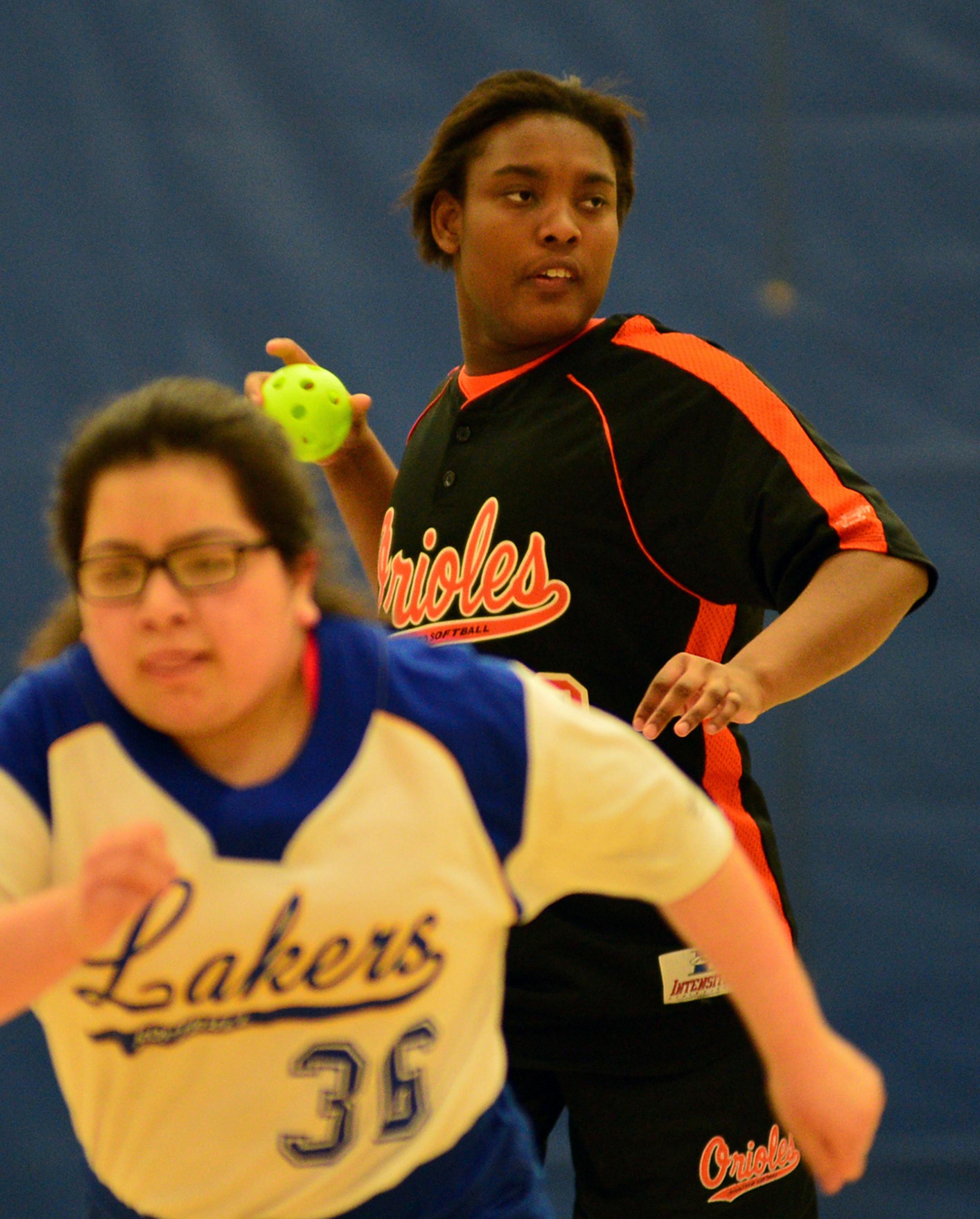 Osseo adapted softball player Tasha during game action at Wayzata High. She sat on the bench with Alex Kreidler on the left and Tulio Nichlas] Richard.Sennott@startribune.com Richard Sennott/Star Tribune Plymouth Minn. Wednesday 4/23/2014) ** (cq) ORG XMIT: MIN1404241040200228
