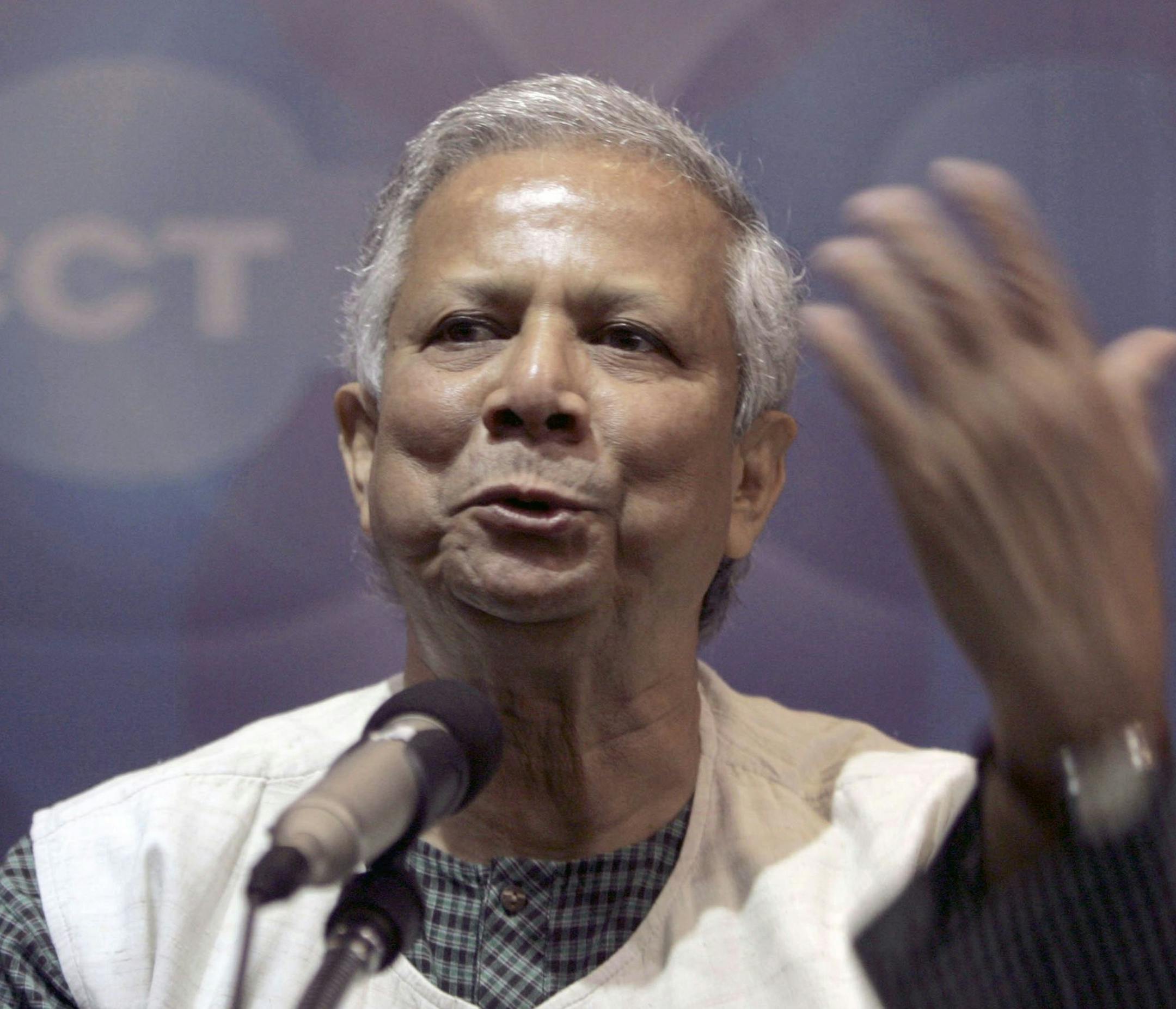 In this Wednesday, Aug. 19, 2009 photo, Nobel Peace laureate and a 2009 recipient of the Presidential Medal of Freedom from U.S. President Barack Obama, Muhammad Yunus gestures as he speaks at the Foreign Correspondents Club, in Bangkok, Thailand. The global financial crisis has highlighted a curious success story: A bank that doles out loans to some of the world's poorest, least creditworthy people continues to have a payback rate of nearly 100 percent. Yunus, known as the "banker to the poor,"