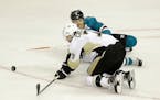Veteran center Matt Cullen, front, and the Penguins have helped hold the Sharks&#x2019; Joe Pavelski, rear, in check. Pavelski had 13 goals in the fir