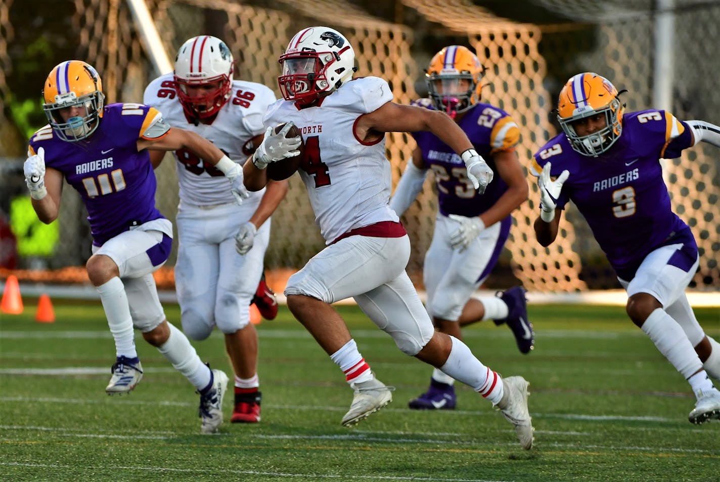 Lakeville North running back Logan Freeburg ran away from defenders in a 55-14 victory over Cretin-Derham Hall on Saturday.