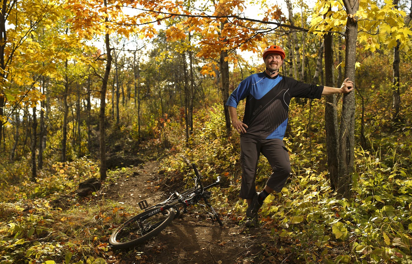 Hansi Johnson on a newly opened mountain bike trail, "Kissing Booth" above Duluth. ] JEFF WHEELER &#x201a;&#xc4;&#xa2; jeff.wheeler@startribune.com Duluth now has an outdoors czar. The Minnesota Land Trust hired Hansi Johnson, a longtime mountain biker, paddler, skier, climber and general enthusiast to work with the city and sporting groups to figure out how to capitalize on Duluth's recreation possibilities. Johnson was photographed on Thursday afternoon, October 9, 2014 on the recently opened