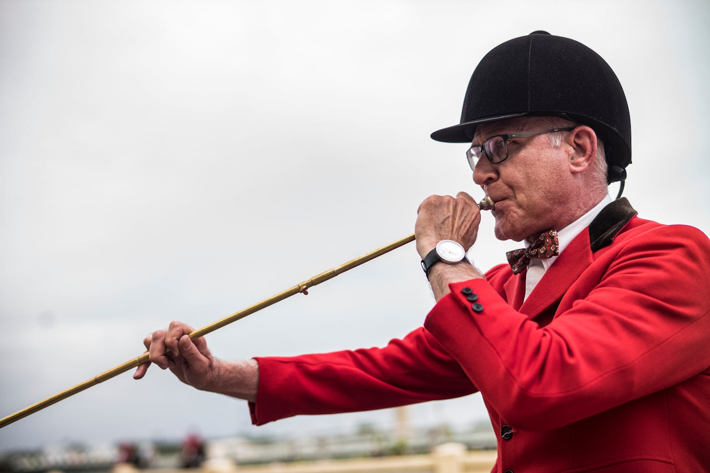 In Shakopee, MN on May 18, 2021, on opening day at Canterbury Park, Lynn Deichert has been playing the bugle before each race for 27 years.] RICHARD TSONG-TAATARII ¥ Richard.Tsong-Taatarii@startribune.com