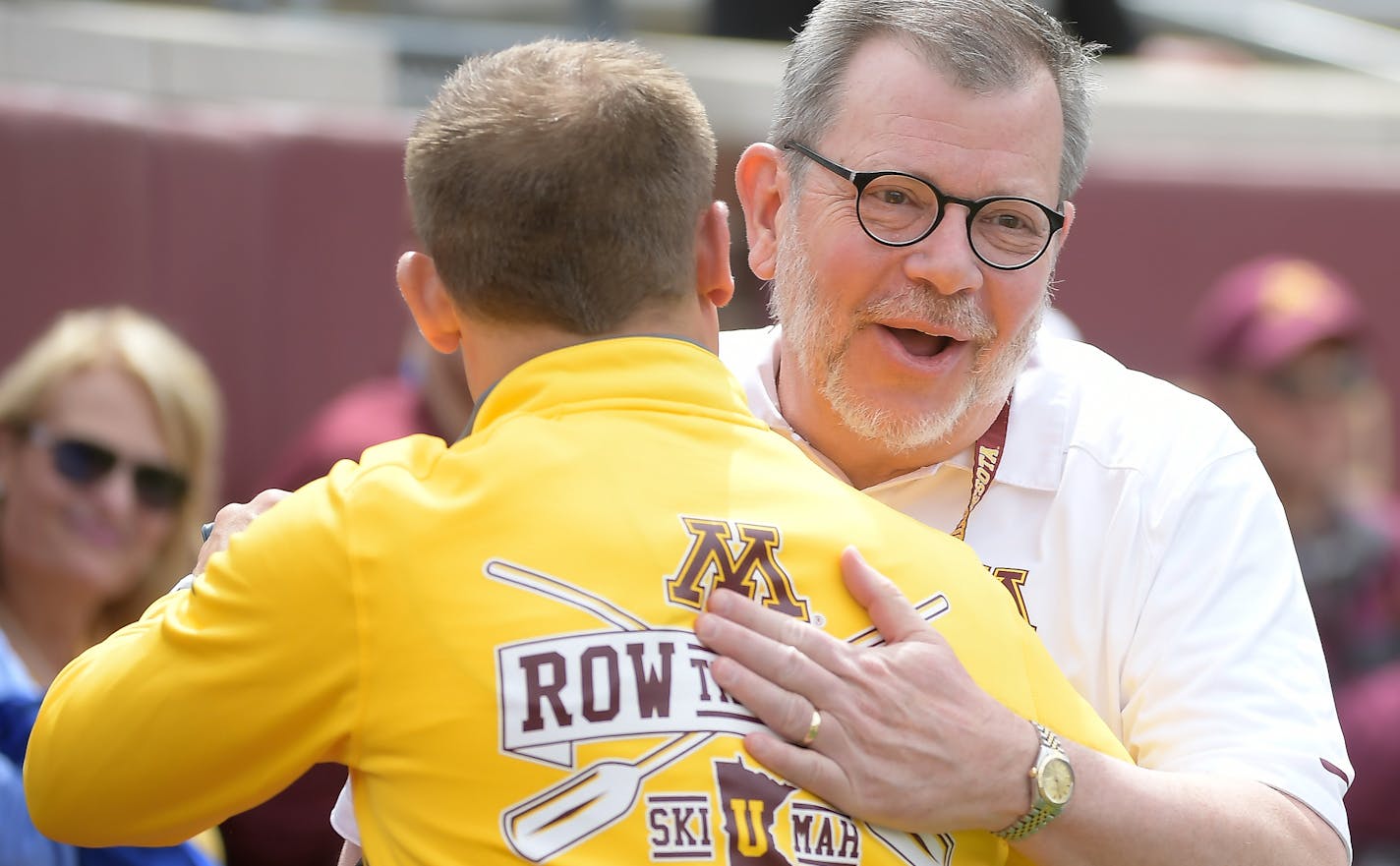 University of Minnesota president Eric Kaler greeted head coach P.J. Fleck before the start of the second half. ] AARON LAVINSKY &#xef; aaron.lavinsky@startribune.com The University of Minnesota Golden Gophers football team played their annual spring game on Saturday, April 17, 2017 at TCF Bank Stadium in Minneapolis, Minn. ORG XMIT: MIN1704151418040777