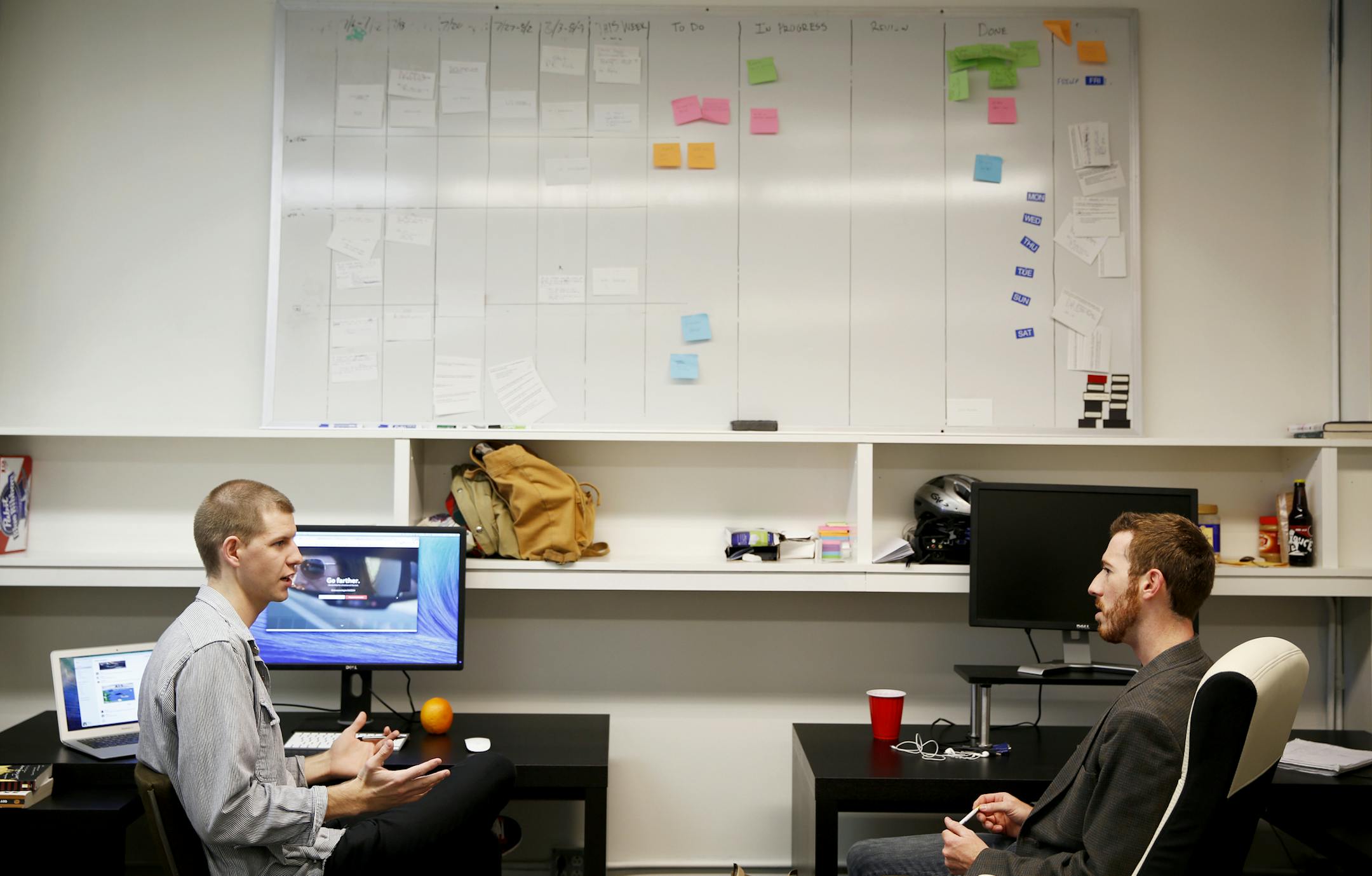 Micah Emmel, left, head of brand development at Divvy, and Divvy founder/CEO Dan Hobbs work in the co-working space Start Up Venture Loft in Minneapolis, Minn. on Tuesday, September 16, 2014. Divvy is a peer to peer collaborative ownership startup company. ] LEILA NAVIDI leila.navidi@startribune.com / BACKGROUND INFORMATION: Kane is developing a supportive community for start up ventures in Minneapolis through the co-working space and regular meetings and presentations for startups.