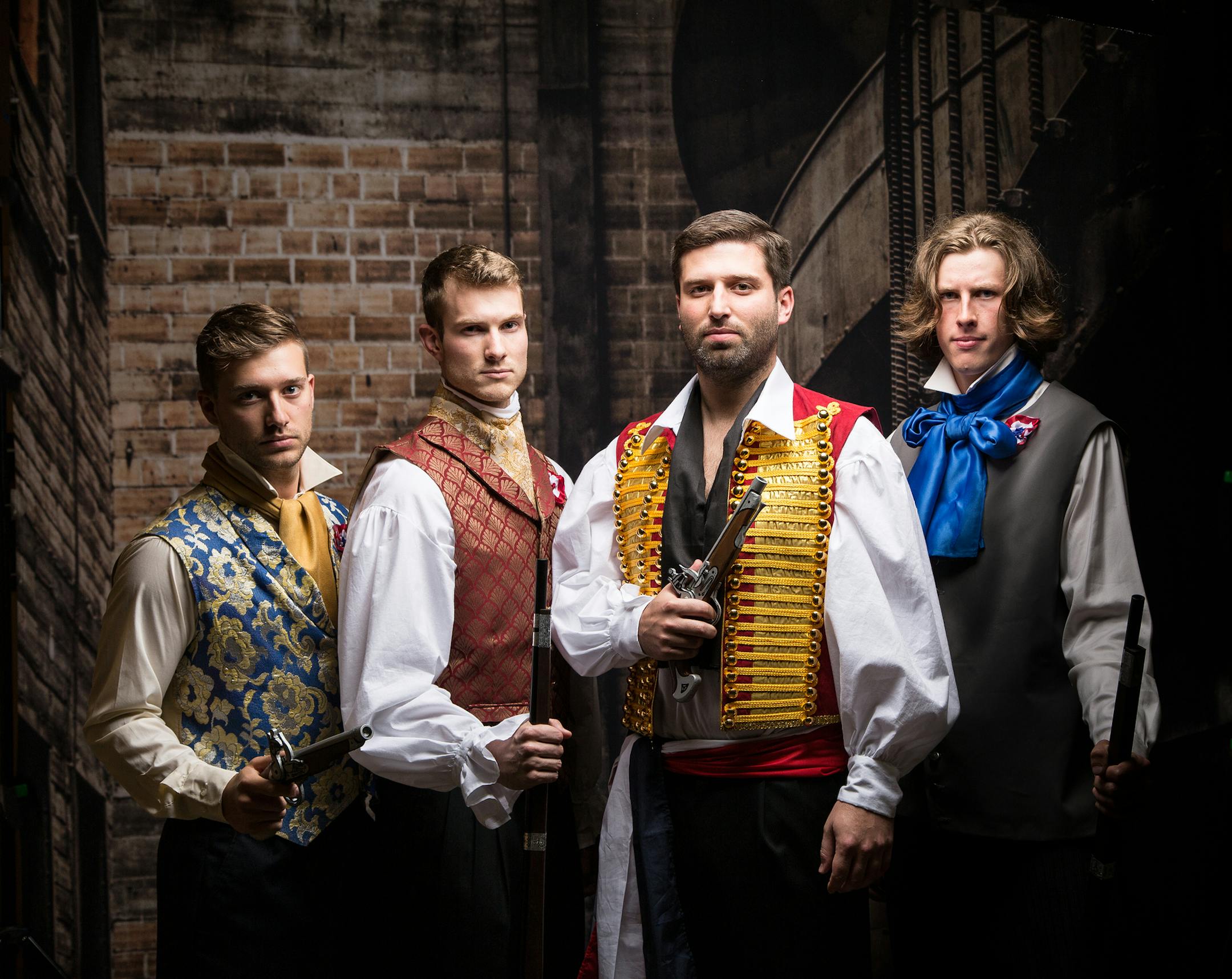 Woodbury Community Theatre's production of Les MisÈrables. David Giest, Collin Smith, Scott Stoneking and Lance Melin as revolutionaries. Photo by Jeanne Berget