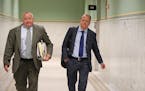 Stephen Frenz and attorney Douglas Turner walked through City Hall in Minneapolis on Thursday, Sept. 7, 2017. ] Shari L. Gross &#x2022; shari.gross@st