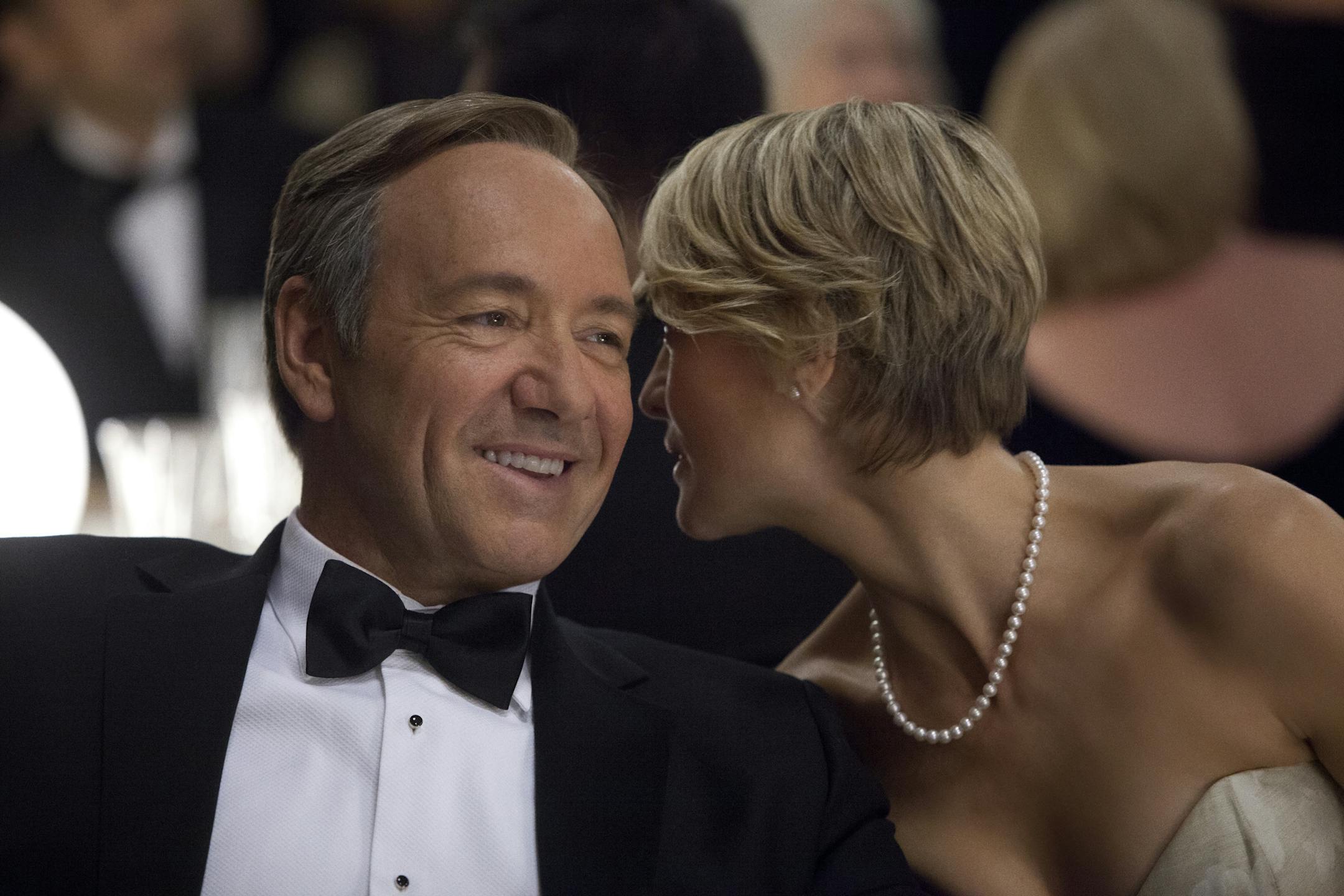 This image released by Netflix shows Kevin Spacey as U.S. Congressman Frank Underwood, left, and Robin Wright as Claire Underwood in a scene from the Netflix original series, "House of Cards." The new original series arrived in one big helping _ all 13 episodes of its first season _ on the subscription streaming service on Friday, Feb. 1, 2013, for viewers to enjoy, at their leisure, in the weeks, months or even years to come. (AP Photo/Netflix, Melinda Sue Gordon) (AP Photo/Netflix) ORG XMIT: M