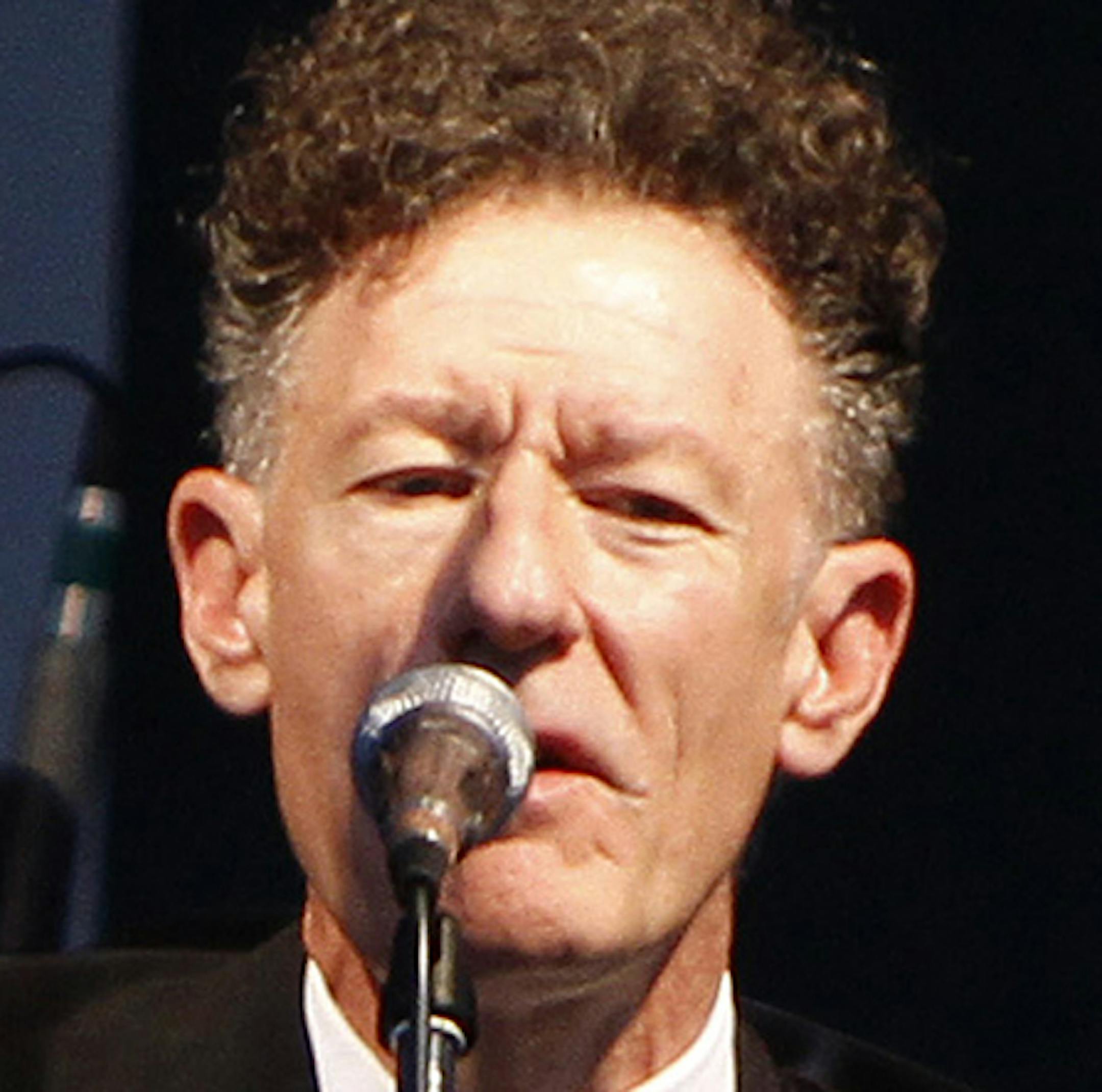 Americana/Roots/Folk singer and songwriter Lyle Lovett performed at The Atlanta Botanical Gardens on Friday, July 26, 2013, in Atlanta, GA. The sold-out crowd enjoyed his hits and stories from his career while dining out under the stars on the lawn. (Photo by Dan Harr/Invision/AP Images) ORG XMIT: 04181313242