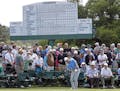 Amateur Sammy Schmitz hits to the ninth green during the first round of the Masters golf tournament Thursday, April 7, 2016, in Augusta, Ga.